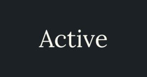 the word active is written on a black card
